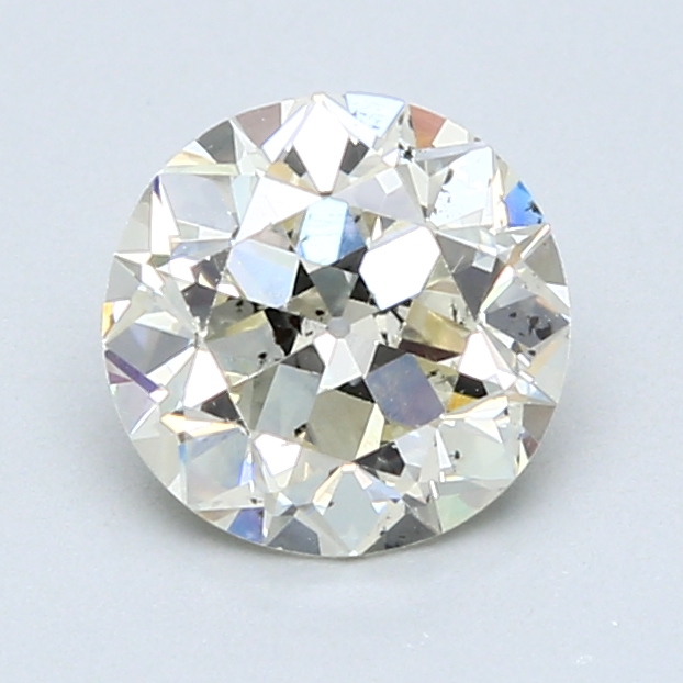 1.47 ct Round Natural Diamond : M / SI2