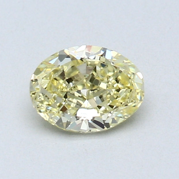 0.56 ct Oval Diamond : Fancy Yellow / SI1
